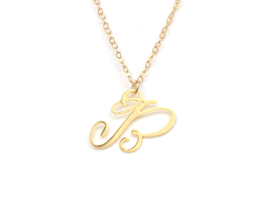 Elsa Peretti® Alphabet pendant in 18k rose gold. Letters A-Z